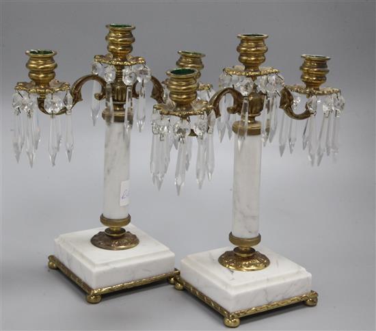 A pair of brass and marble candelabra, diameter 26cm